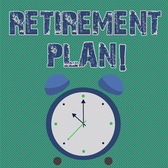 Handwriting text writing Retirement Plan. Conceptual photo income goals actions and decisions necessary achieve goals Colorful Round Analog Two Bell Alarm Desk Clock with Seconds Hand photo