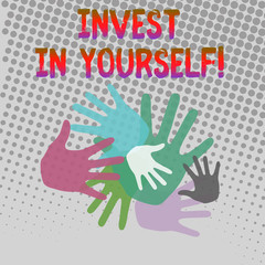 Fototapeta premium Writing note showing Invest In Yourself. Business concept for learn new things or materials thus making your lot better Hand Marks of Different Sizes for Teamwork and Creativity
