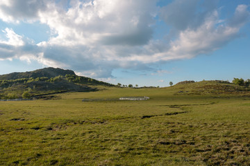 Fototapeta premium wooden fence for animals on the top of the hills