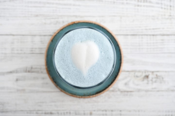 Blue matcha latte in glass