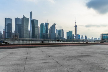 Fototapeta na wymiar empty square and city skyline at dusk, shanghai city, china.