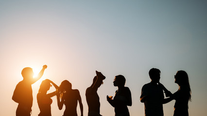 Fototapeta premium Friends partying during summer vacation