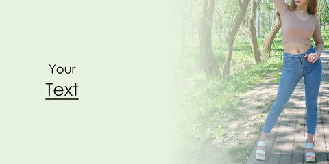 Photograph of a beautiful girl woman on nature in the park with long flowing beautiful hair in a pink sweater and blue jeans on a sunny day is standing right in front of the camera and smiling.