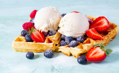 sweet belgian waffles with berries and ice cream