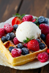 belgian waffles with ice cream and berries
