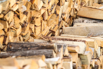 Beautiful view of stacked wood in a beautiful sunny day, countryside.