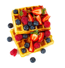 waffles with berries isolated on white