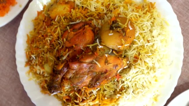Closing into Special Gosht Biryani from the streets of Karachi, Pakistan.