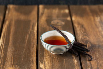 vanilla extract on wooden surface