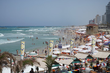 Tel-Aviv, Israel - 14 May 2019 - Landscape View of Tel-Aviv Beach Crowded with People. Travel and Tourism