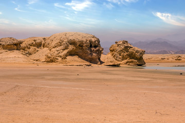 Fototapeta na wymiar Head of Lion Rock mountain rock formations sandy plateaus.