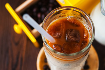 Fresh iced coffee in a tall glass.