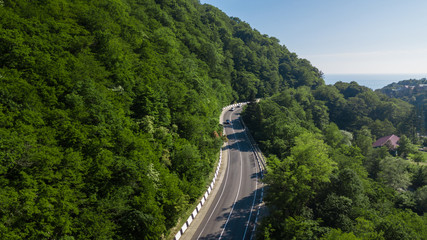 Curved asphalt highway road in mountains of South Russia