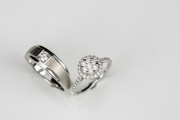 Couple diamond rings on white isolated