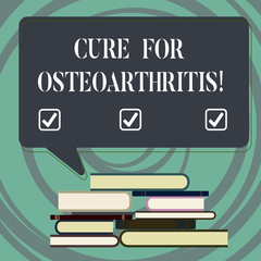 Handwriting text writing Cure For Osteoarthritis. Concept meaning Treatment for the pain and stiffness of joints Uneven Pile of Hardbound Books and Blank Rectangular Color Speech Bubble