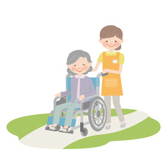 介護士に車椅子を引いてもらうおばあゃん