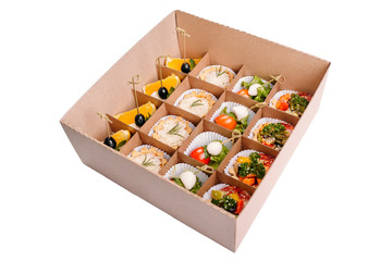 Collection of take away kraft boxes with  different food. Set of containers with everyday meals - meat, vegetables and law fat snacks on white background, top view. 