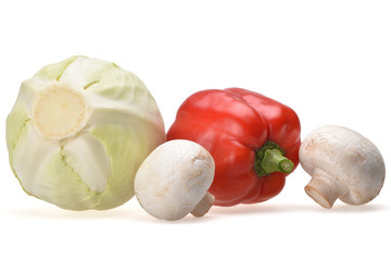 Dietary composition of white cabbage, red bell pepper and champignon mushrooms on a neutral white background