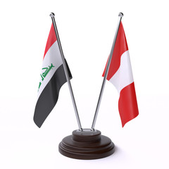 Iraq and Peru, two table flags isolated on white background. 3d image