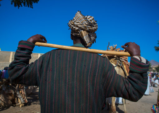 Man with a stick at monday market, Keren, Eritrea