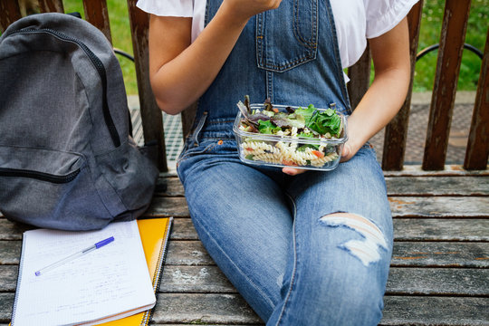 Teenage student having healthy lunch