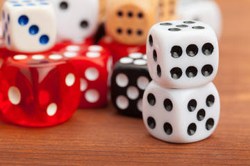 Dice on a wooden table. Concept for business risk.