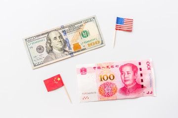 Creative top view flat lay of China and USA flag, mockup and copy space on white background in minimal style. Concept of trade war between USA and China