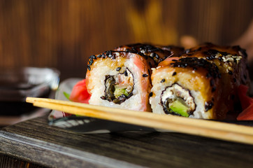 sushi rolls with red fish