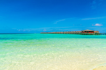 Beautiful water villas in tropical Maldives island  .