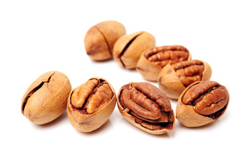 Pecan nuts on white background