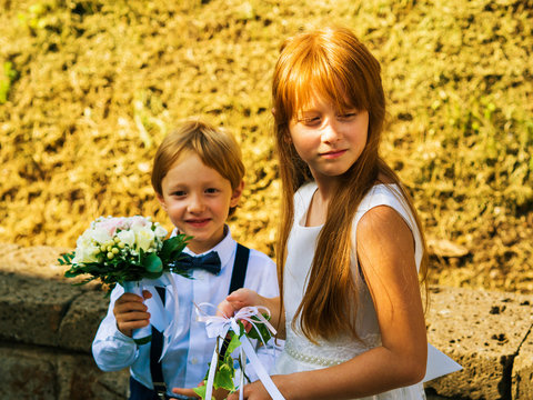 Ring Bearer And Flower Girl At Summer Wedding