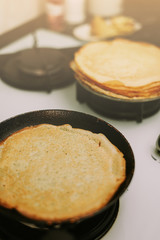 Russian pancakes in a pan