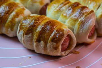 Dishes from the dough, sausages in the test