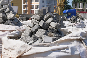 Construction Materials. Building materials for decoration and construction buildings and houses. Gray stones are sold in construction market. Close up.