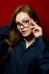 beautiful girl in jeans in the Studio