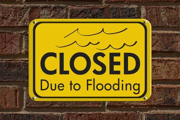 Closed Due to Flooding sign