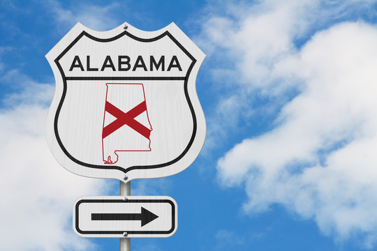 Alabama map and state flag on a USA highway road sign