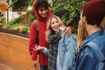 Fototapeta premium Group if cheerful multiethnic friends teenagers