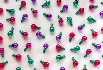 colorful light bulbs, red purple background