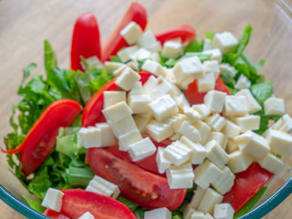 Top view healthy greek salad with vegetables
