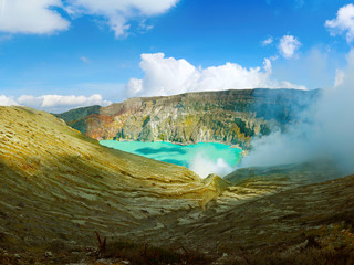 SMOKE OF SULFUR ON KAWAH IJEN VOLCANO IN JAVA ISLAND-INDONESIA