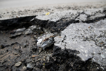 Cracked surface of an asphalt road