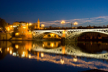 bridge triana sevilla andalucia spain at night with lights