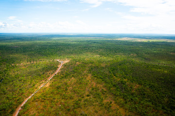 Fototapeta premium POV from light aircraft flying over Kakadu National Park showing rugged landscape