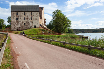 Fototapeta na wymiar Road to the medieval Kastelholm Castle (built in 14th century), Aland islands, Finland