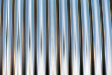 Obraz premium Partially view of a chrome roll. Chrome structures in a row.