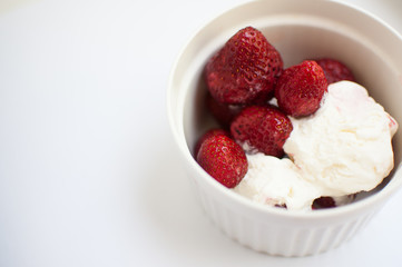 strawberries with ice cream in sundae