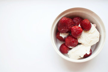 strawberries with ice cream in sundae