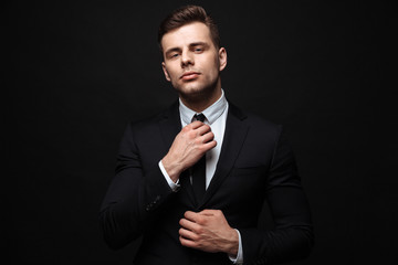 Handsome confident businessman wearing suit