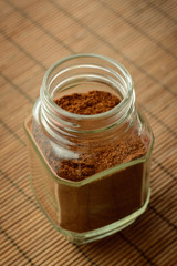 Jar of instant coffee on table